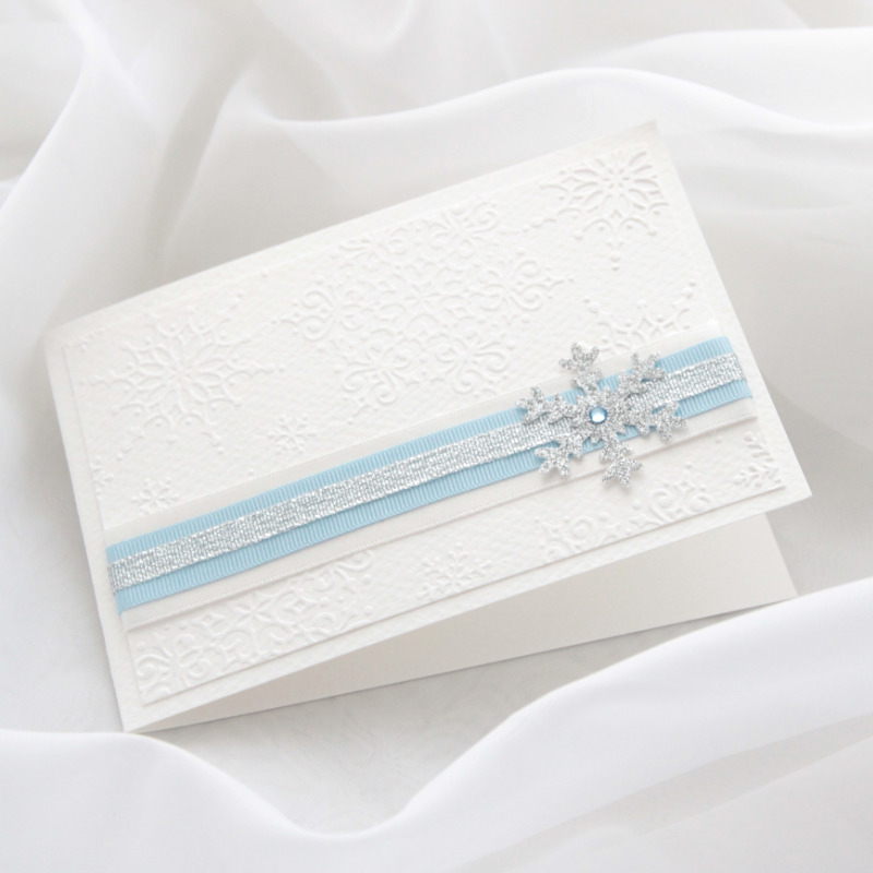 Kaart särava lumehelbega